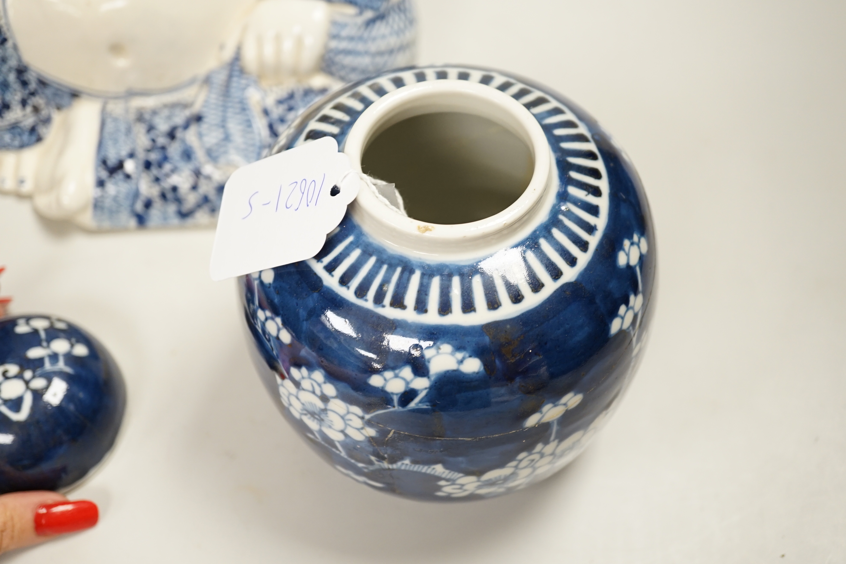 Chinese ceramics including a Buddha, prunus flower ginger jar and plates, the largest 26cm high